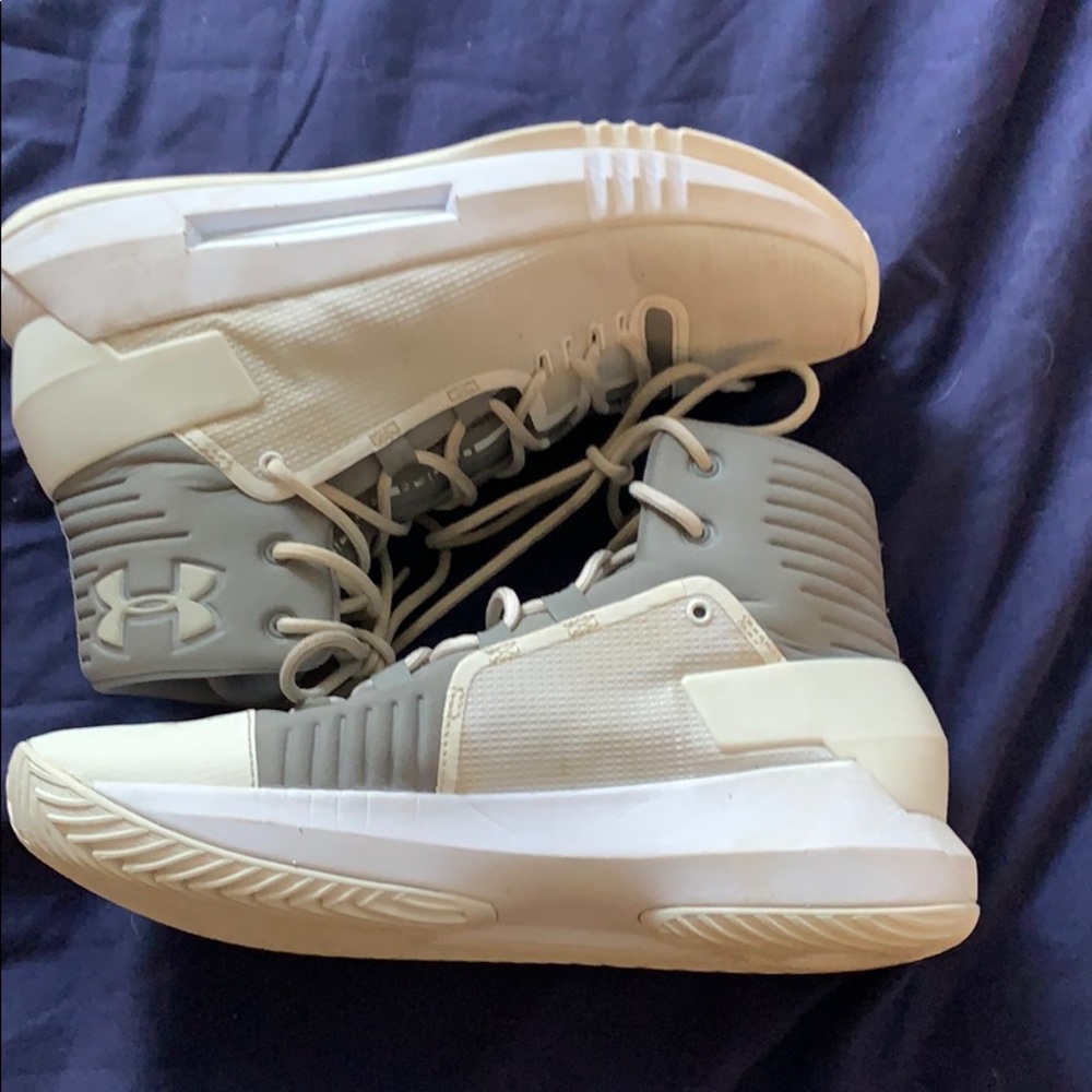 white and grey basketball shoes under armour